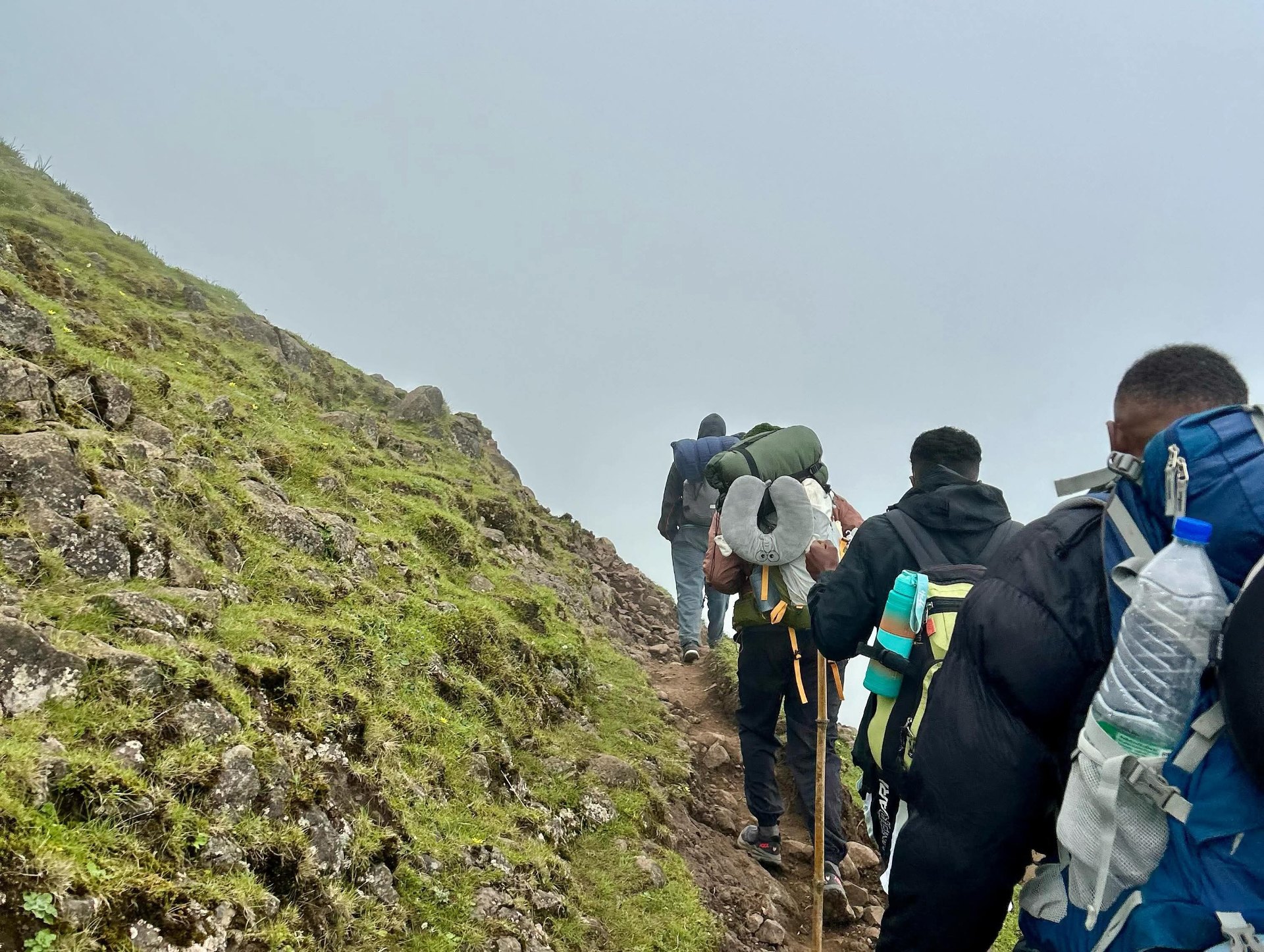 Trekkers on a rocky Ethiopian highland trail